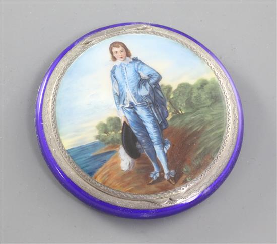 An early 20th century continental silver and enamel compact, the lid decorated with Gainsboroughs Blue Boy, 60mm.